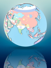 Obraz premium Bhutan on political globe with flags