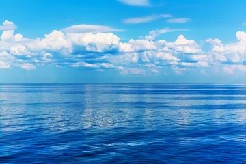 Papier Peint photo Côte Blue sea or ocean and sky with clouds