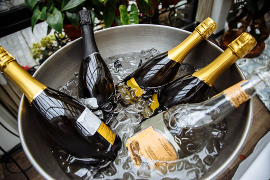 Bottles of champagne with ice.