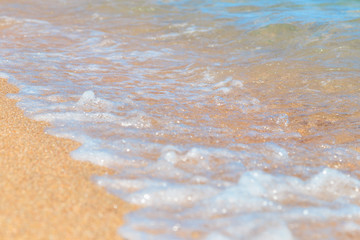 Sea wave, running on the sandy shore