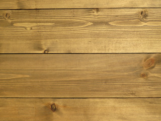 Wood flooring, unpainted wooden boards texture. Brown panels background