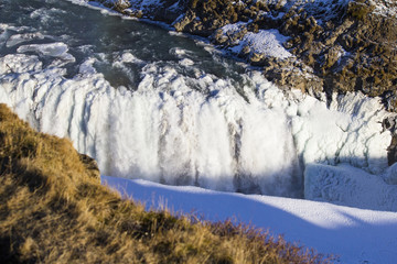 The amazing show of the Gulfoss waterfall during winter time. Gulfoss is located in the canyon of Hvítá river in southwest Iceland.