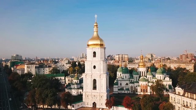 Kiev Kiyv Ukraine with Places of Interest. Saint Sophia's Cathedral, square with Bohdan Khmelnytsky Monument. Aerial drone video footage. Sunrise light. Camera falls down