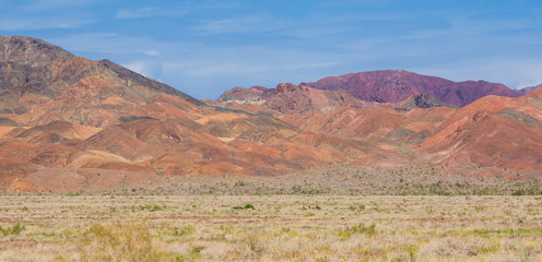 red volcanic mountains Altyn-Emel, Kazakhstan, Almaty © serikbaib