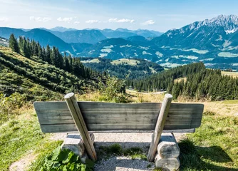Foto op Canvas bench at a mountain © fottoo