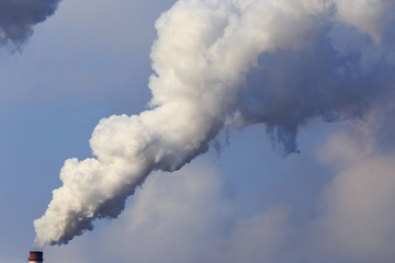 Smoke from the pipes of the factory