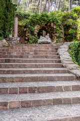 Stone stairs leading to the grotto of the nymph Egeria built by Bagutti in 1804 in Horta Labirinth...