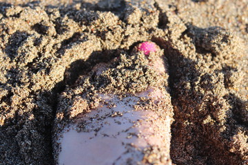 Foot in the sand