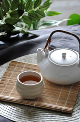 Hot Tea Set on Bamboo Mat