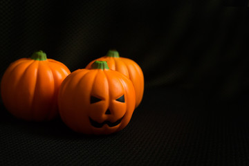 The halloween pumpkin jack in black holiday background image.