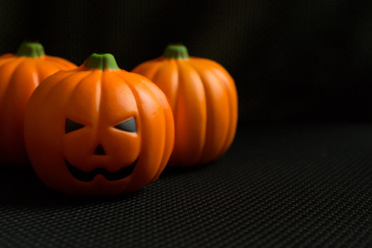 The halloween pumpkin jack in black holiday background image.