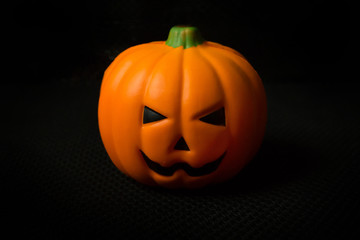 The halloween pumpkin jack in black holiday background image.
