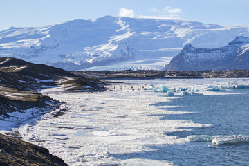 Beautiful cold winter landscape with icebergs in Jökulsárlón glacial lagoon, Vatnajökull National Park, southeast of Iceland, Europe.