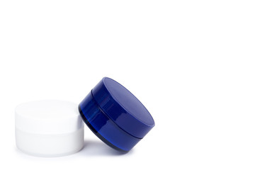 Clean cream bottle isolated on white background, copy space template