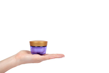 Clean cream bottle with hand isolated on white background, copy space template