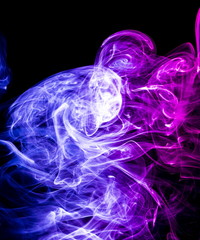 Colored smoke on black background