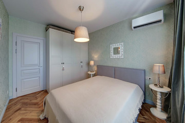 The light bedroom with white cases