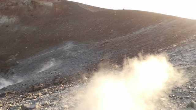 sunset on the crater of Vulcano with sulfur fumaroles, Aeolian Islands, Sicily