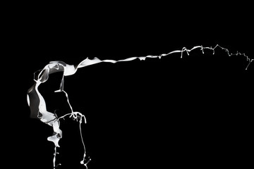 White paint splash isolated on black background.