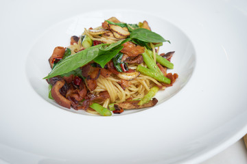 delicious spaghetti with dry chilli and beacons