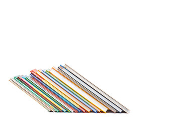 Different colorfull books in stack isolated on white background, copy space template