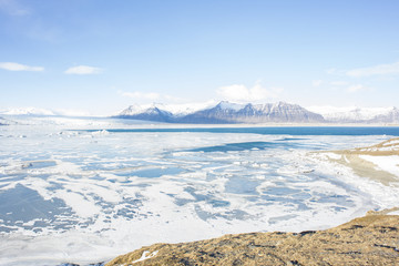 Beautiful cold winter landscape with icebergs in Jökulsárlón glacial lagoon, Vatnajökull National Park, southeast of Iceland, Europe.