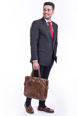 Businessman isolated in white background.