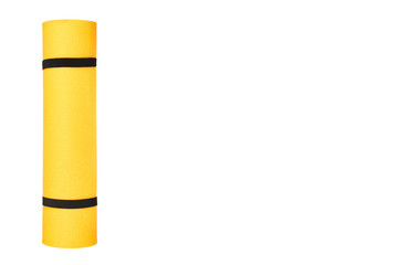 Close up view of yellow yoga mat for exercise, isolated on white background, copy space template. © Sviatoslav Kovtun