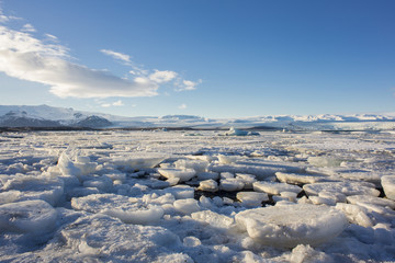 Beautiful cold winter landscape with icebergs in Jökulsárlón glacial lagoon, Vatnajökull National Park, southeast of Iceland, Europe.