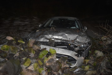 Photo of a non-fatal collision taken after a Ford Focus hit a wall on a snowy night