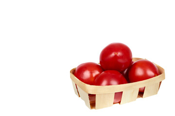 Fresh organic red tomato with package isolated on the white background, copy space template.