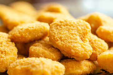 Golden deep fried chicken nuggets, fast snacks