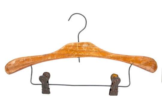 Old wood cloth hanger with clips isolated on white background