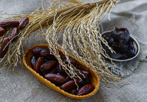 Raw Organic Fresh dates together with fint jam and dry branch from dates.