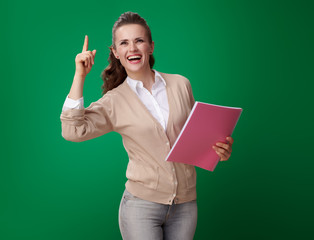 happy modern student woman with pink notebook got idea
