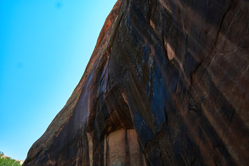 Towering Canyon Walls in Escalante National Monument backpacking through Coyote Gulch