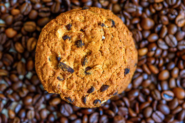 chocolate shortbread cookies on a background of coffee beans