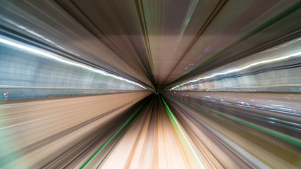 Blurred image of Subway tunnel with Motion blur of a monorail Train futures of transport in modern city