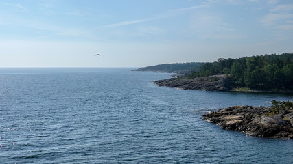 Fototapeta na wymiar Beautiful rocky coastline. Grisslehamn, Sweden