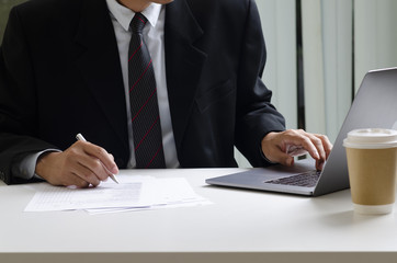 Businessman working with labtop
