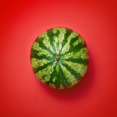 Watermelon isolated on a red background