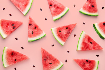 Watermelon slices pattern viewed from above. Top view. Summer concept. - obrazy, fototapety, plakaty