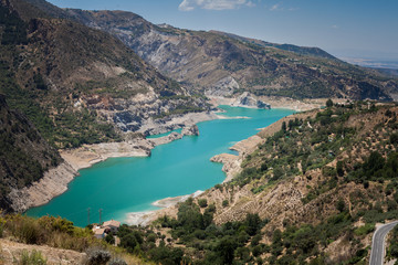 Fototapeta na wymiar Mountain Lake in the south of Spain in summer