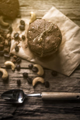 freshly baked chocolate chip cookies on rustic wooden table