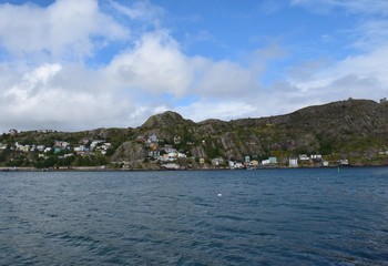 view across the harbour towards Signal Hill and the Battery neighborhood, St John's Newfoundland Canada