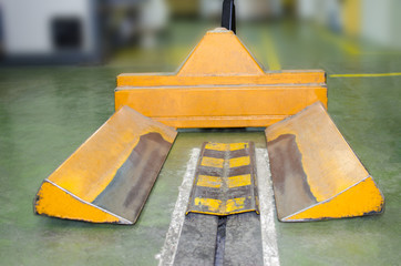 Detail of empty paper rolls trolley in printing plant