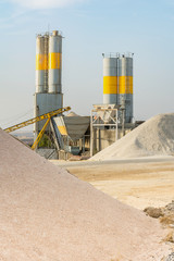 Obraz premium Quarry with silo in an industrial zone