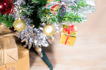 Christmas decorations backdrop merry Xmas Happy new year, Christmas tree and Gift box Gold Bokeh and fireworks background