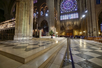 Paris, France- circa May, 2017: Gothic interior of the Notre Dame de Paris Cathedral on May, 2017 in Paris. The cathedral of Notre Dame is one of the top tourist destinations in Paris