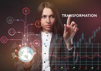 The concept of business, technology, the Internet and the network. A young entrepreneur working on a virtual screen of the future and sees the inscription: Transformation